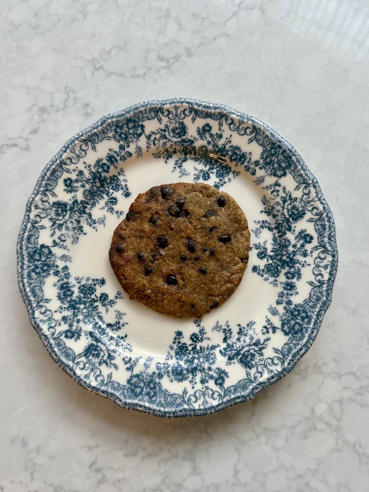 MOLTO cookie on a blue floral plate